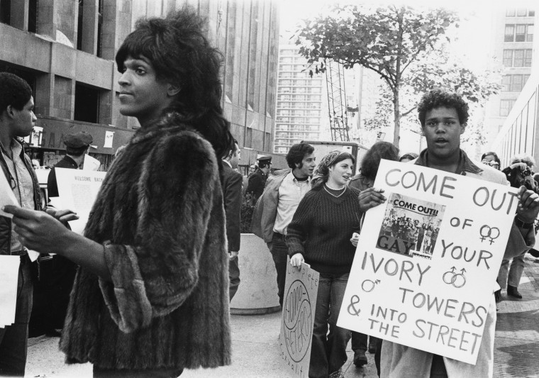 Marsha P. Johnson hands out flyers for support of gay students at N.Y.U.