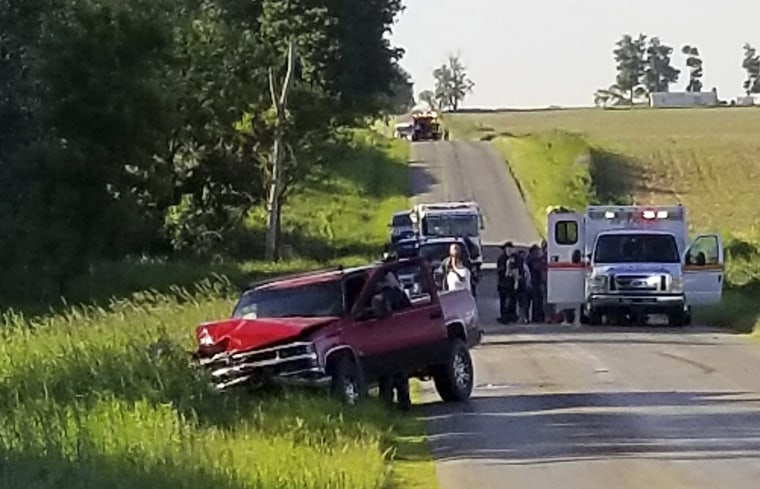 Image: A damaged truck sits on the side of the road after it crashed into a horse-drawn carriage in California Township, Michigan, on June 7, 2019.