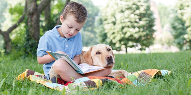 Gavin Swearingen and his service dog, Elmer