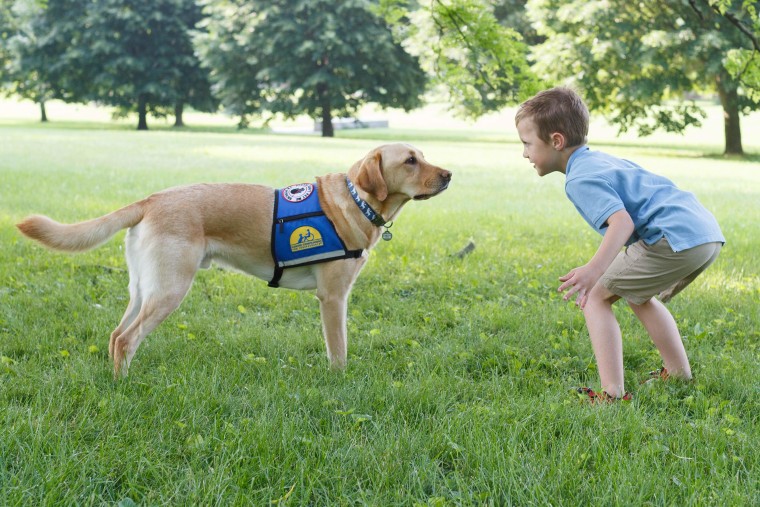 Gavin Swearingen and his service dog, Elmer