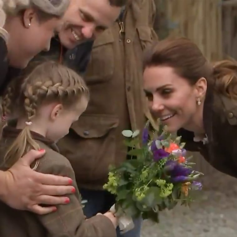 Flowers and braids and a smiling princess Kate.