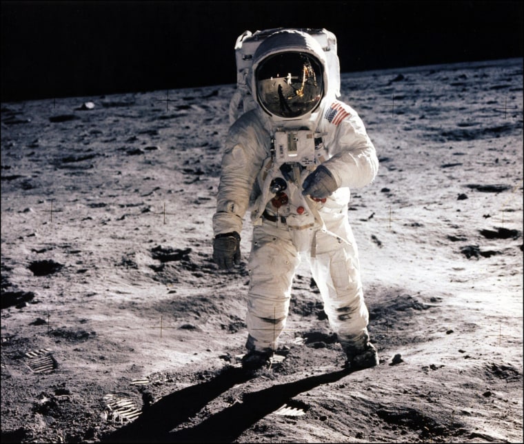 Image: astronaut Edwin E. Aldrin Jr. walks on the surface of the moon .