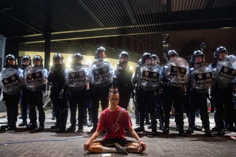 Image: Police gather at a rally in Hong Kong