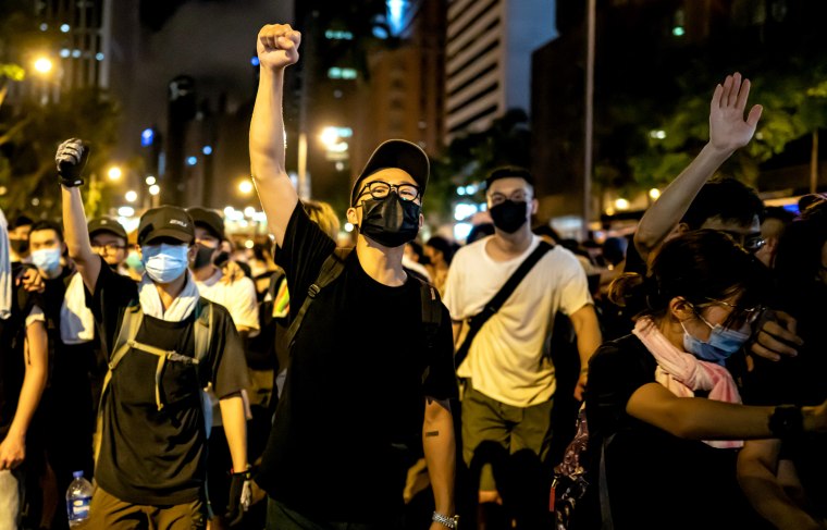 Image: Protesters clash with police after a rally against an extradition law in Hong Kong on June 10, 2019.