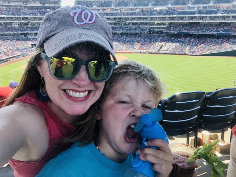 Jenn Folsom chaperoning her son Anderson's 6th grade field trip to a Nationals game.