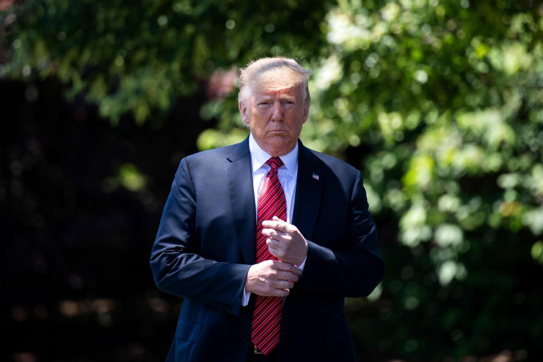 Image: President Donald Trump leaves the Oval Office to speak with reporters on June 11, 2019.