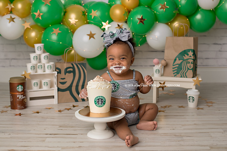Aria Jade Dillon goes was all smiles for this delicious Starbucks cake.