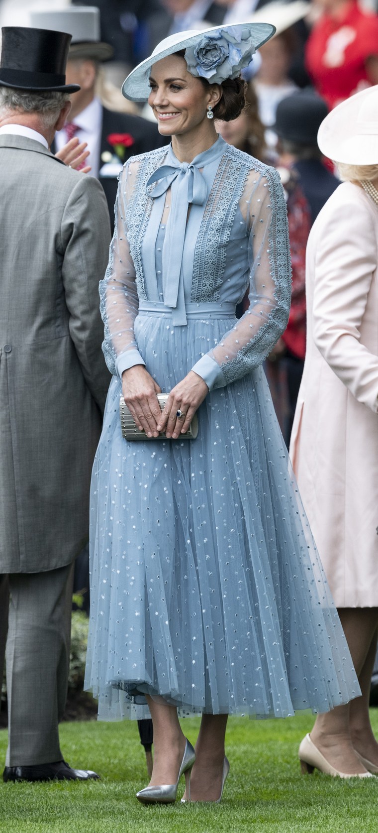 Kate stuns in a recycled blue lace dress by Elie Saab alongside the Duchess  of Edinburgh