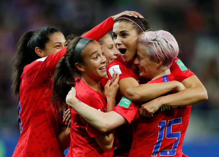 Alex Morgan and Team USA celebrate after a goal during the World Cup