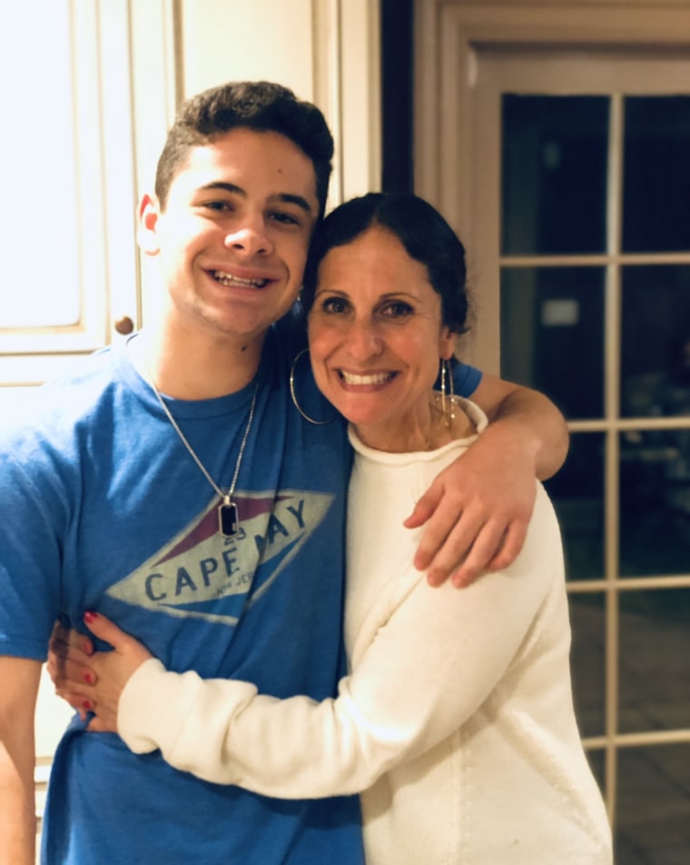 Jenny Grossman hugs her son Cooper