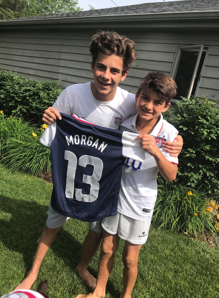 Boys wear U.S. women's soccer World Cup jerseys