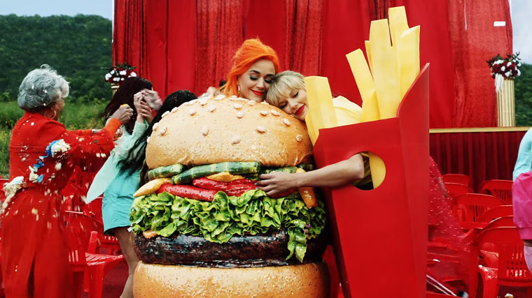 Image: Taylor Swift and Katy Perry ended their feud with a hug in Swift's music video for \"You Need To Calm Down.\"