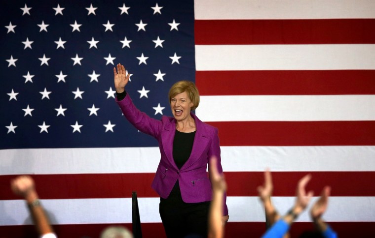 Tammy Baldwin greets supporters at a campaign rally for Barack Obama in Milwaukee, Wisconsin, on Nov. 3, 2012.  In 2012, Baldwin became the first openly LGBT person elected to the United States Senate.