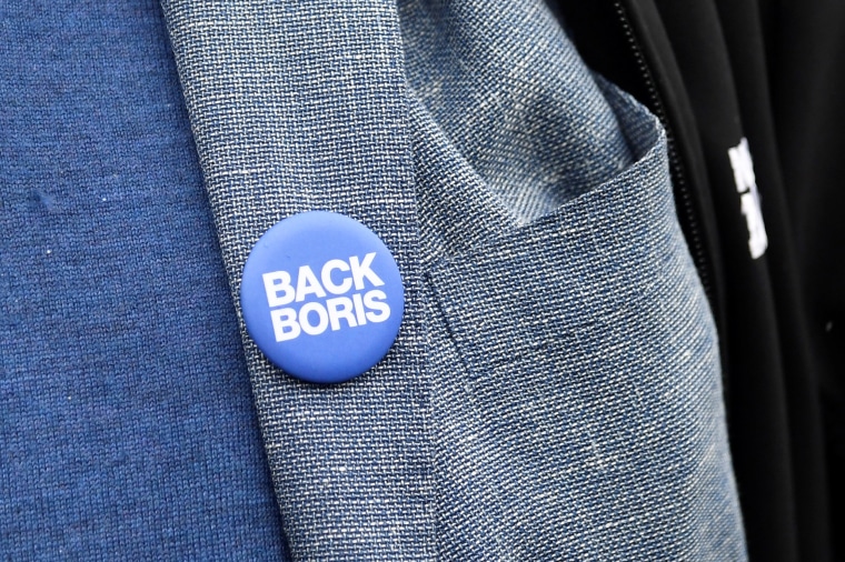 Image: Stanley Johnson, father of Boris Johnson, wears a "Back Boris" badge in London