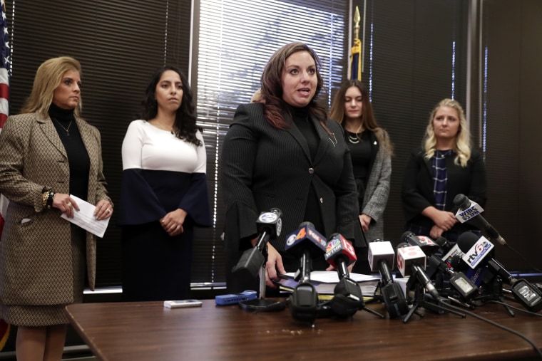 Image: Attorney Hannah Kaufman Joseph announces the filing of a civil lawsuit against Indiana Attorney General Curtis Hill during a press conference in Indianapolis on Oct. 23, 2018. Joseph is joined by by the accusers, from left, Rep. Mara Candelaria Rea