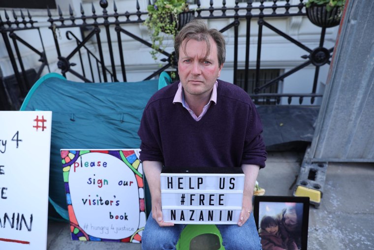 Image: Richard Ratcliffe, husband of British-Iranian woman Nazanin Zaghari-Ratcliffe who is emprisoned in Iran, sits during his hunger strike outside the Iranian embassy