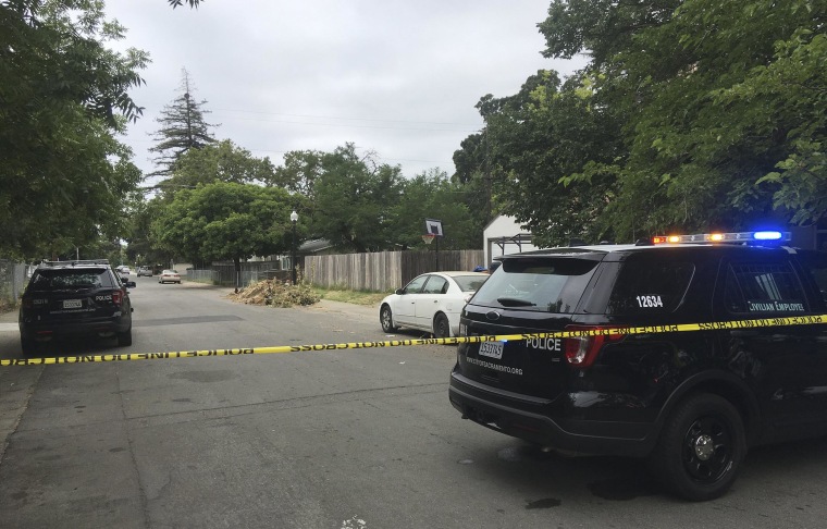 Image: Sacramento police continue to block off the scene where a police officer was fatally shot in Sacramento