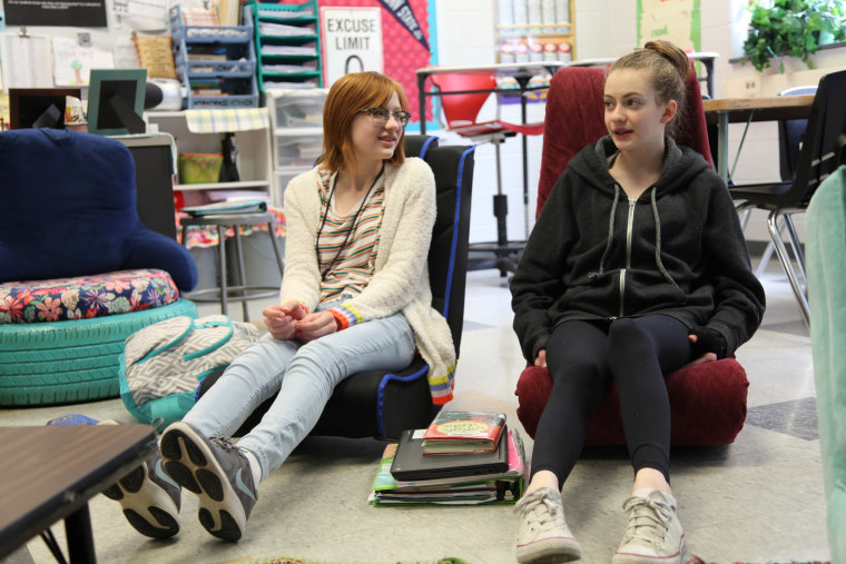Seventh graders Evan-June Pineo and Grace Simpson say the variety of seating choices in their language arts classroom at Mechanicsburg Middle School, in Pennsylvania, helps to keep things fresh. Evan-June especially likes the floor-level rockers because the movement helps her to concentrate.