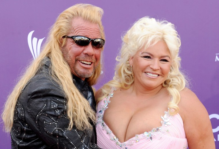 Image: Duane Lee \"Dog\" Chapman and Beth Chapman arrive at MGM Grand Garden Arena in Las Vegas on April 7, 2013.