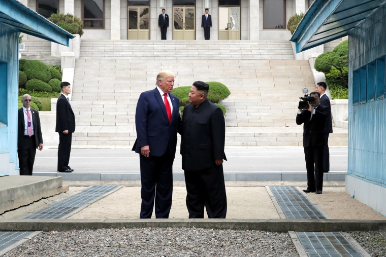 Image: President Donald Trump and North Korean leader Kim Jong Un meet at the demilitarized zone separation North and South Korea on June 30, 2019.