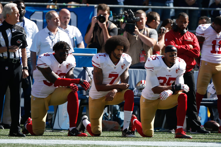 Colin Kaepernick kneels during NFL national anthem