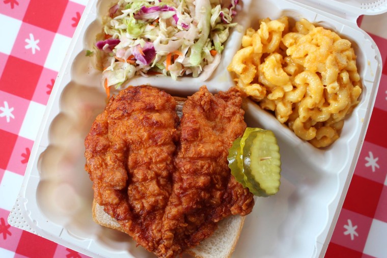 A plate of fried chicken and sides at Hot Chicken Takeover in Columbus