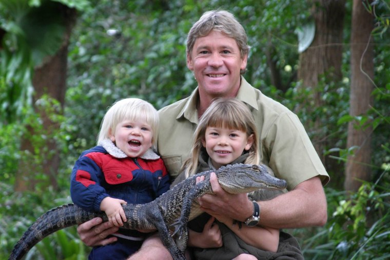 "Crocodile Hunter" Steve Irwin with his children, Robert and Bindi, and a 3-year-old alligator called Russ at Australia Zoo in 2005.