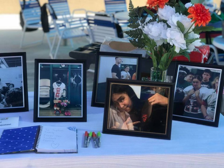 A memorial table was set up at the pre-scheduled pool party on July 1. 