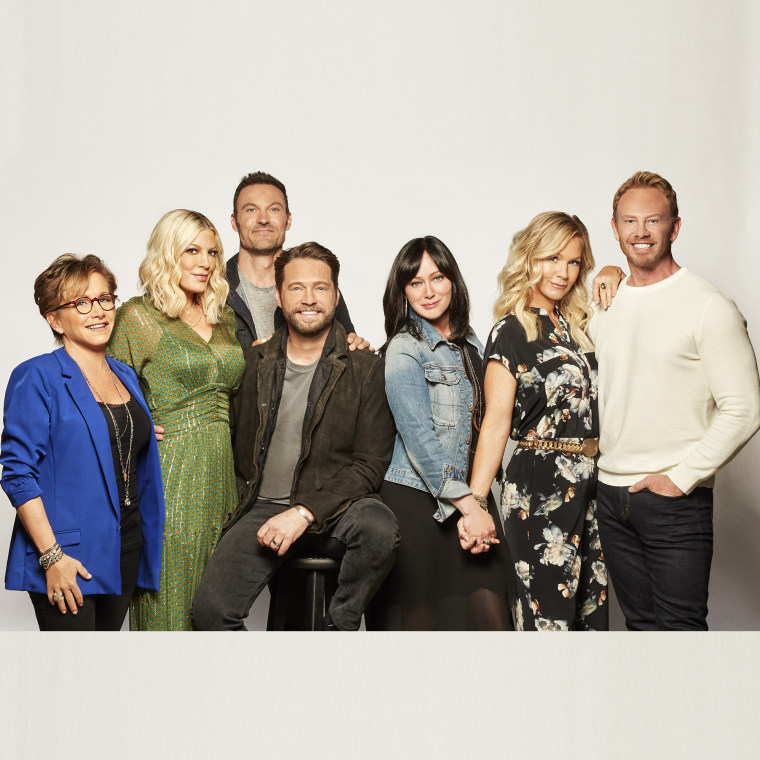 The ladies and gentlemen of "Beverly Hills, 90210" are all back in the saddle for "BH90210." From l.-r.: Gabrielle Carteris, Tori Spelling, Brian Austin Green, Jason Priestley, Shannen Doherty, Jennie Garth and Ian Ziering.