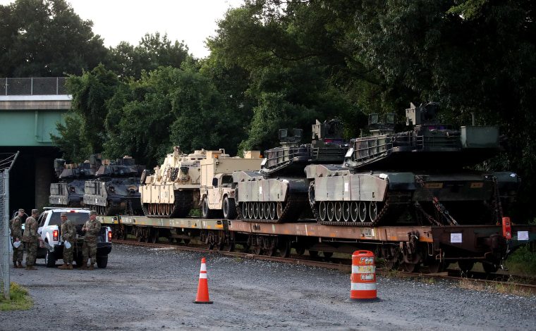 Image: M1A1 Abrams tanks and other military vehicles sit on rail cars in Washington, D.C., on July 2, 2019. President Trump requests military hardware for Independence Day celebrations on the National Mall.