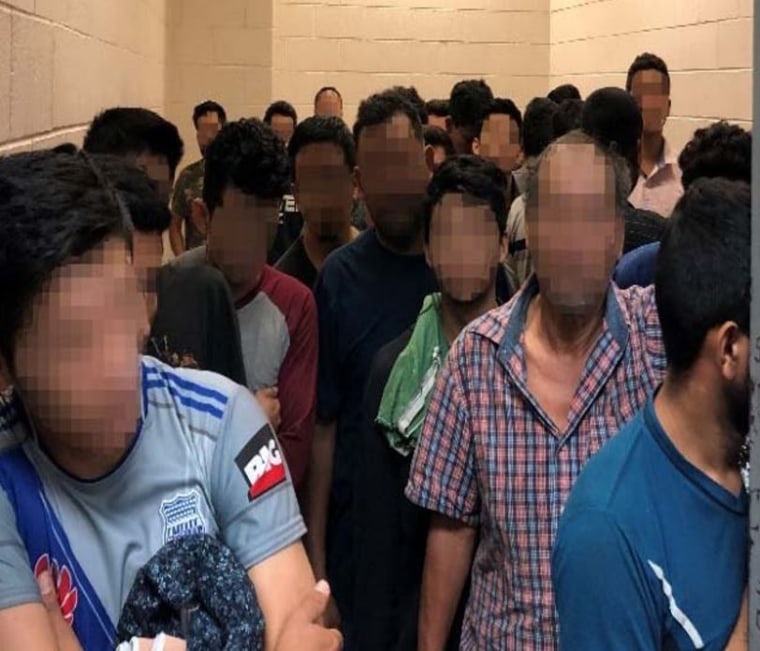 Overcrowding in a room for adult males at the Border Patrol's McAllen, Texas, facility on June 10, 2019. Faces blurred by source.