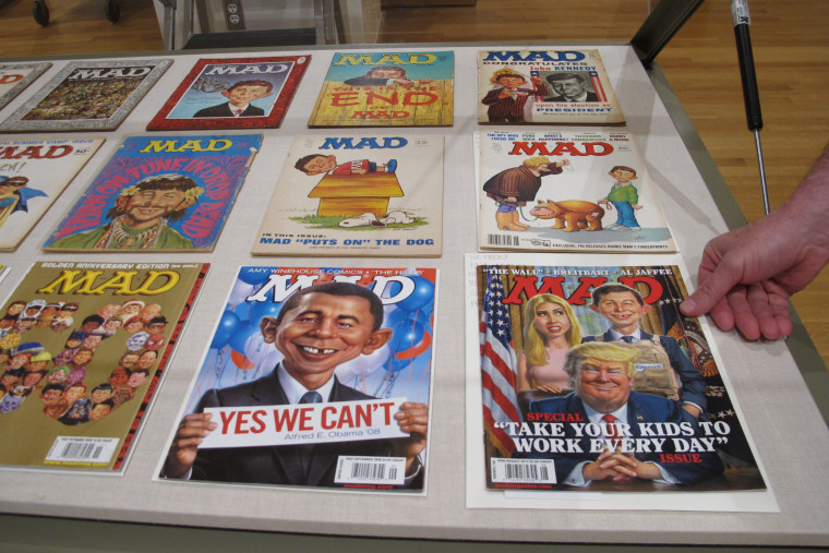 An exhibit celebrating the artistic legacy of MAD magazine that includes several examples of magazines over the years is displayed on Thursday, May 3, 2018, in Columbus, Ohio.