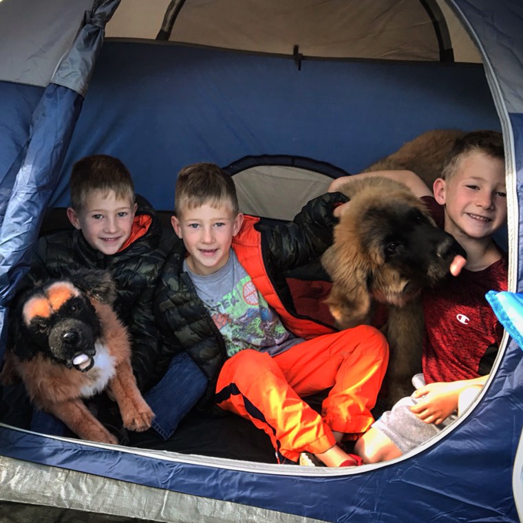 The triplets from Wyoming testing out my new tent.