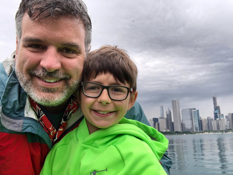 Nathan Dede posed for a photo with his dad, Chris, during his third grade field trip.