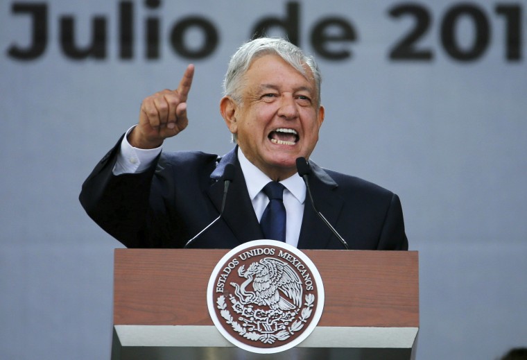 Image: Mexico's President Andres Manuel Lopez Obrador delivers his speech during rally to celebrate the one-year anniversary of his election, in Mexico City's main square, the Zocalo