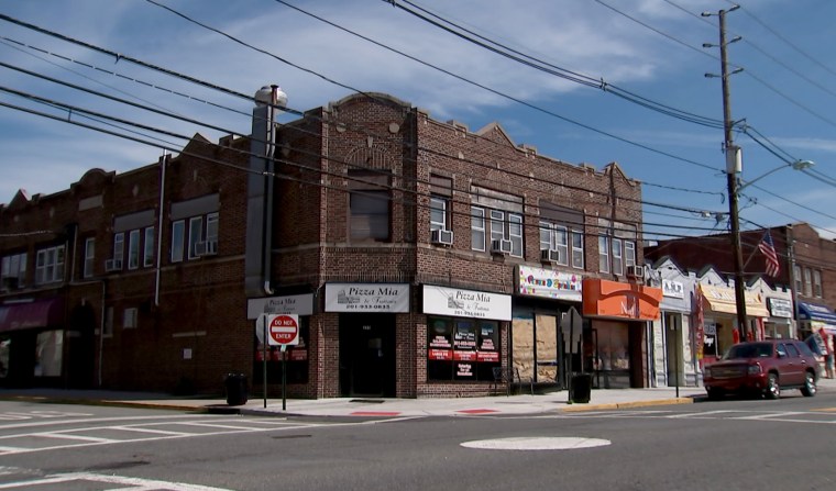 Image: Joseph Schwartz listed a tiny office above this New Jersey pizzeria in Wood Ridge, NJ as the location where he ran over 100 nursing homes nationwide.