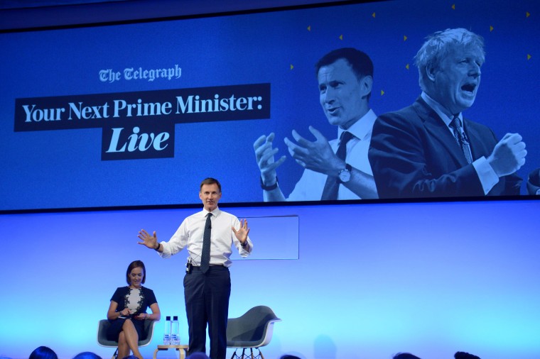 Image: Conservative leadership candidate Jeremy Hunt gestures as he speaks in London on July 8.