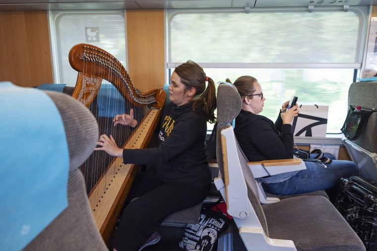 Image: Stina Hellberg Agback 33 years old and a harp player, who turned down an opportunity to tour in the U.S., because she would not fly for her work anymore over climate concerns takes the train back to Uppsala from Stockholm.