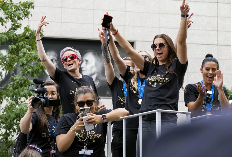 Image: Megan Rapinoe, Alex Morgan and other U.S. women's soccer team players stand on a float before the start of a ticker-tape parade to celebrate their World Cup victory in New York on July 10, 2019.