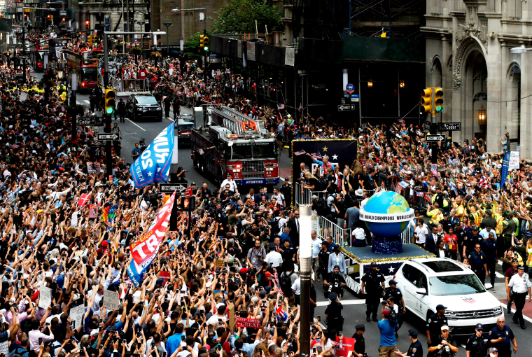 Image: Fans and players celebrate the U.S. women's soccer team's fourth World Cup win with a ticker-tape parade on July 10, 2019.