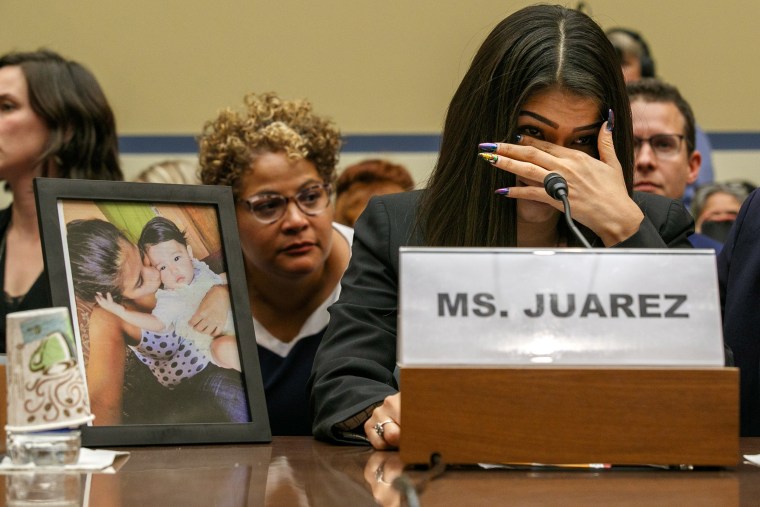 Image: Yazmin Juarez, reacts as a photos of her daughter, Mariee, 1, who died after being released from detention by U.S. Immigration and Customs Enforcement, is placed next to her at a House Oversight subcommittee hearing on Civil Rights and Civil Libert
