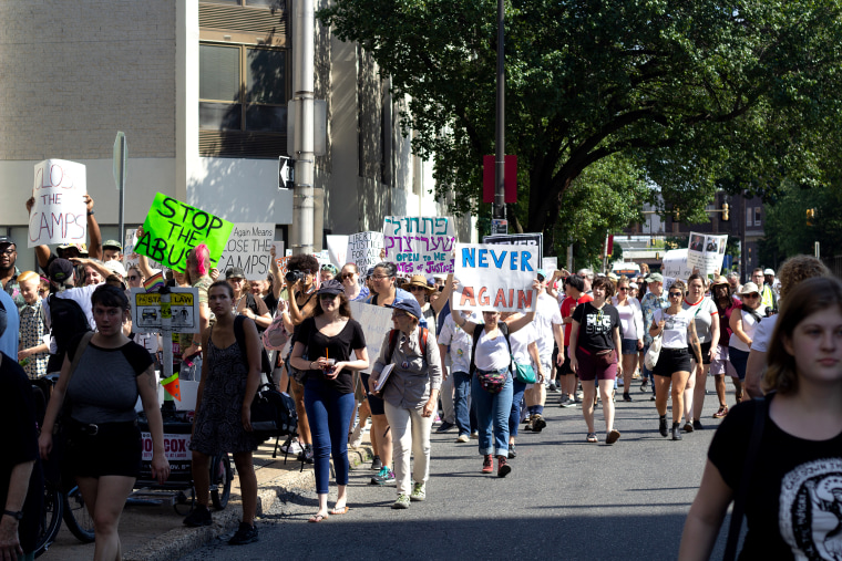 Members of Never Again Action took to the streets to protest ICE and the conditions of migrants in detention on July 4, 2022 in Philadelphia.