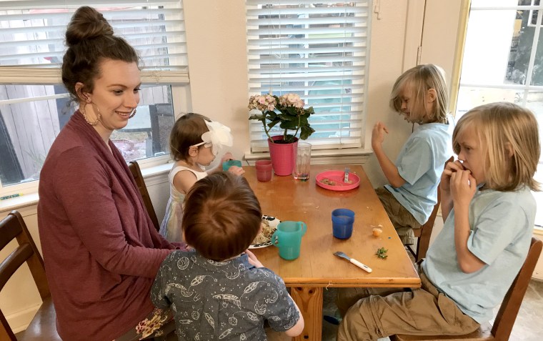 Desiree Mieir sits down to dinner with her four kids.