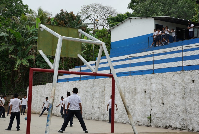 Students at the centro escolar play soccer during recess