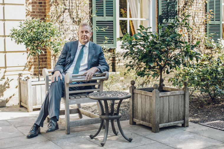 Image: The British Ambassador to Washington, D.C, Sir Kim Darroch, poses for a portrait outside in the English garden of the ambassadors residence