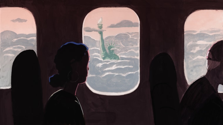 A woman gazes out an airplane window at the Statue of Liberty engulfed in clouds.