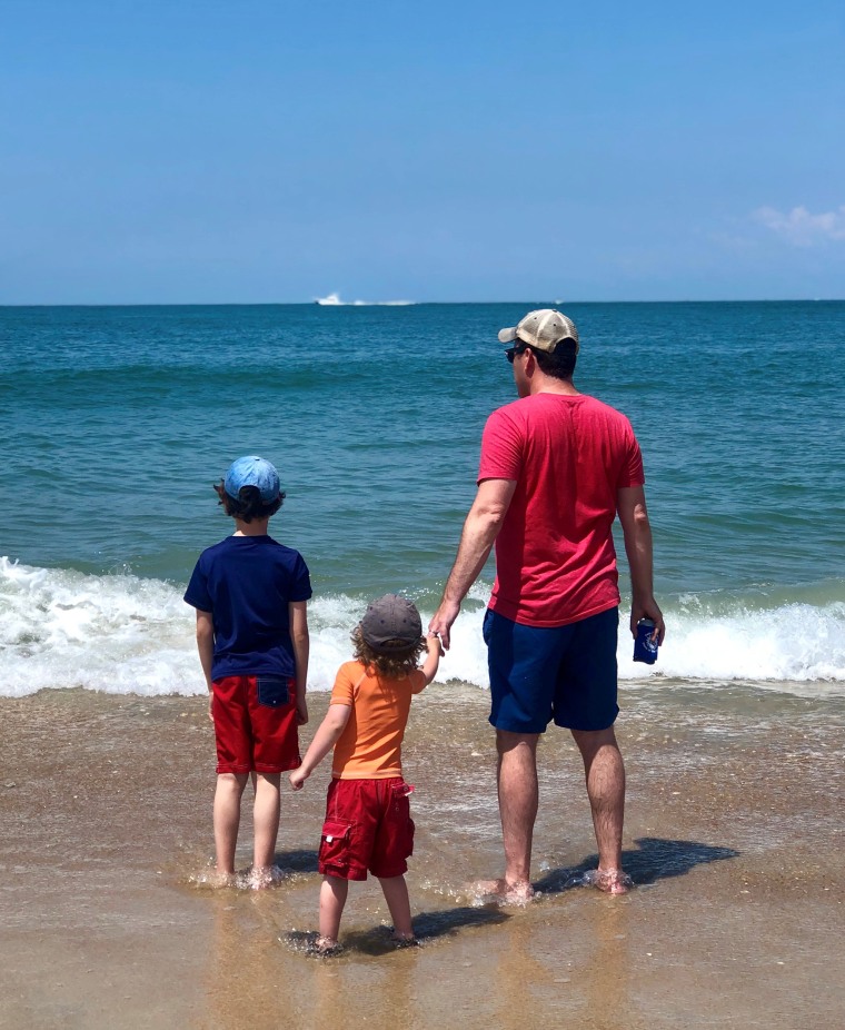 Mike Julianelle with his sons at the beach. 
