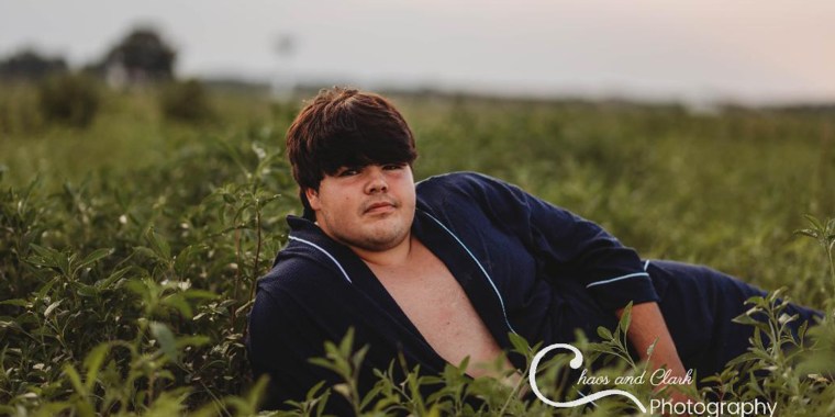Photographer Tiffany Clark asked Evan Dennison, 17, "How do you feel about doing senior photos?" and received this expression from him during their photo shoot.