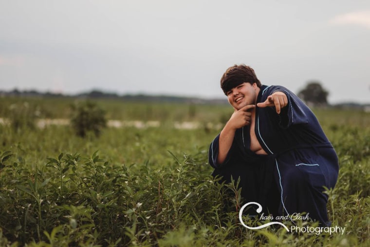 Evan Dennison asked photographer Tiffany Clark to take a picture of him in this pose specifically. Of course.