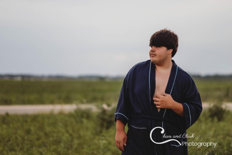 The internet loves Evan Dennison's senior photos in a bathrobe. His mom does too, but... not for her living room.